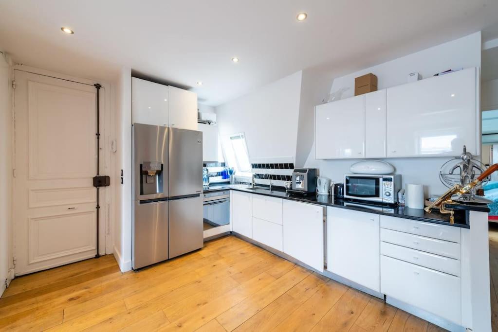 Appartement Vue Tour Eiffel Париж Экстерьер фото